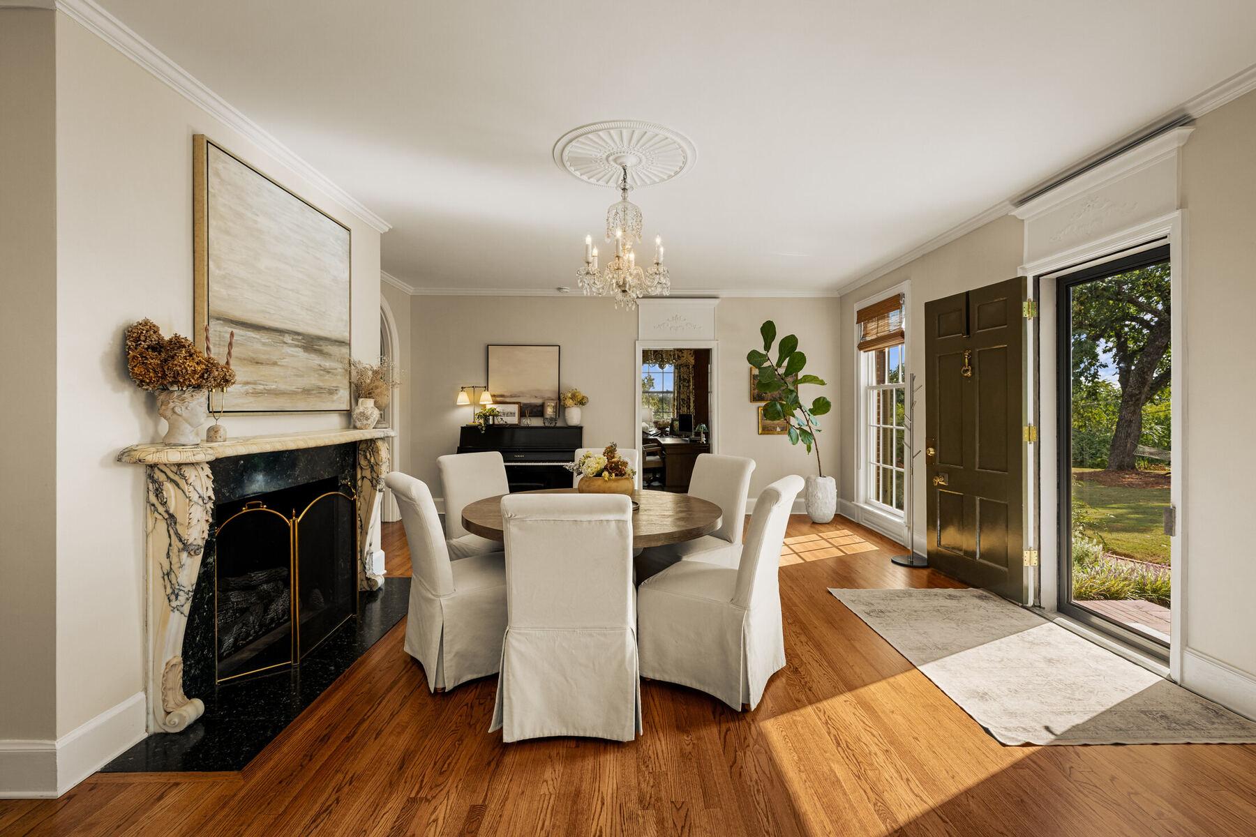 Dining room and sculptural stone mantel