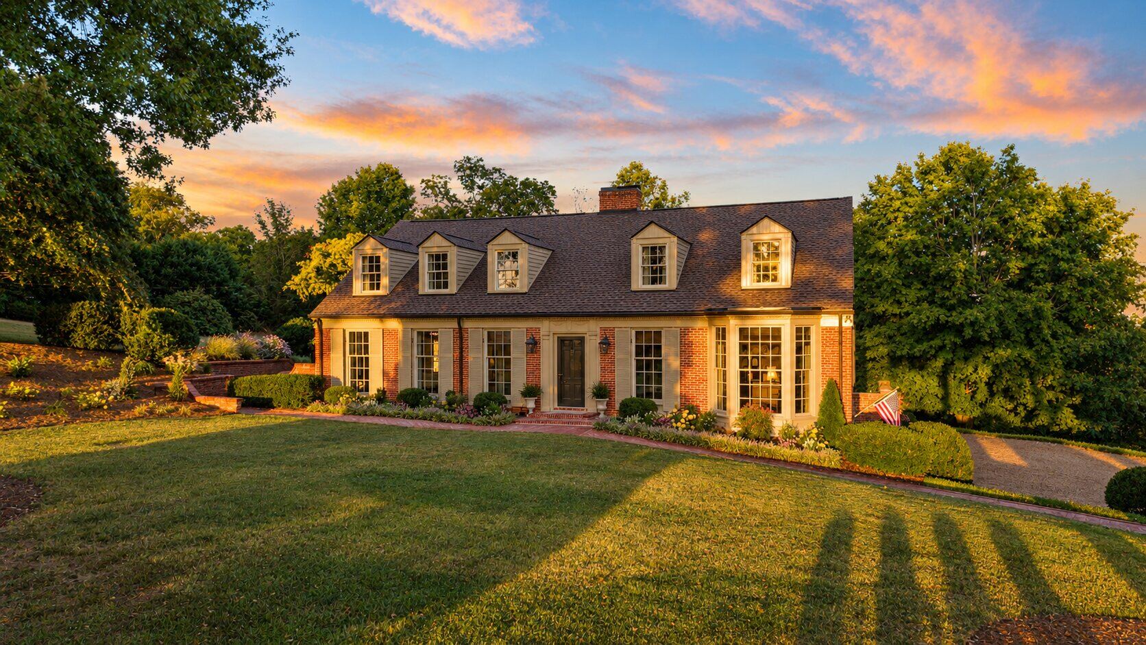 Oak Cliff Manor glowing in the late afternoon light