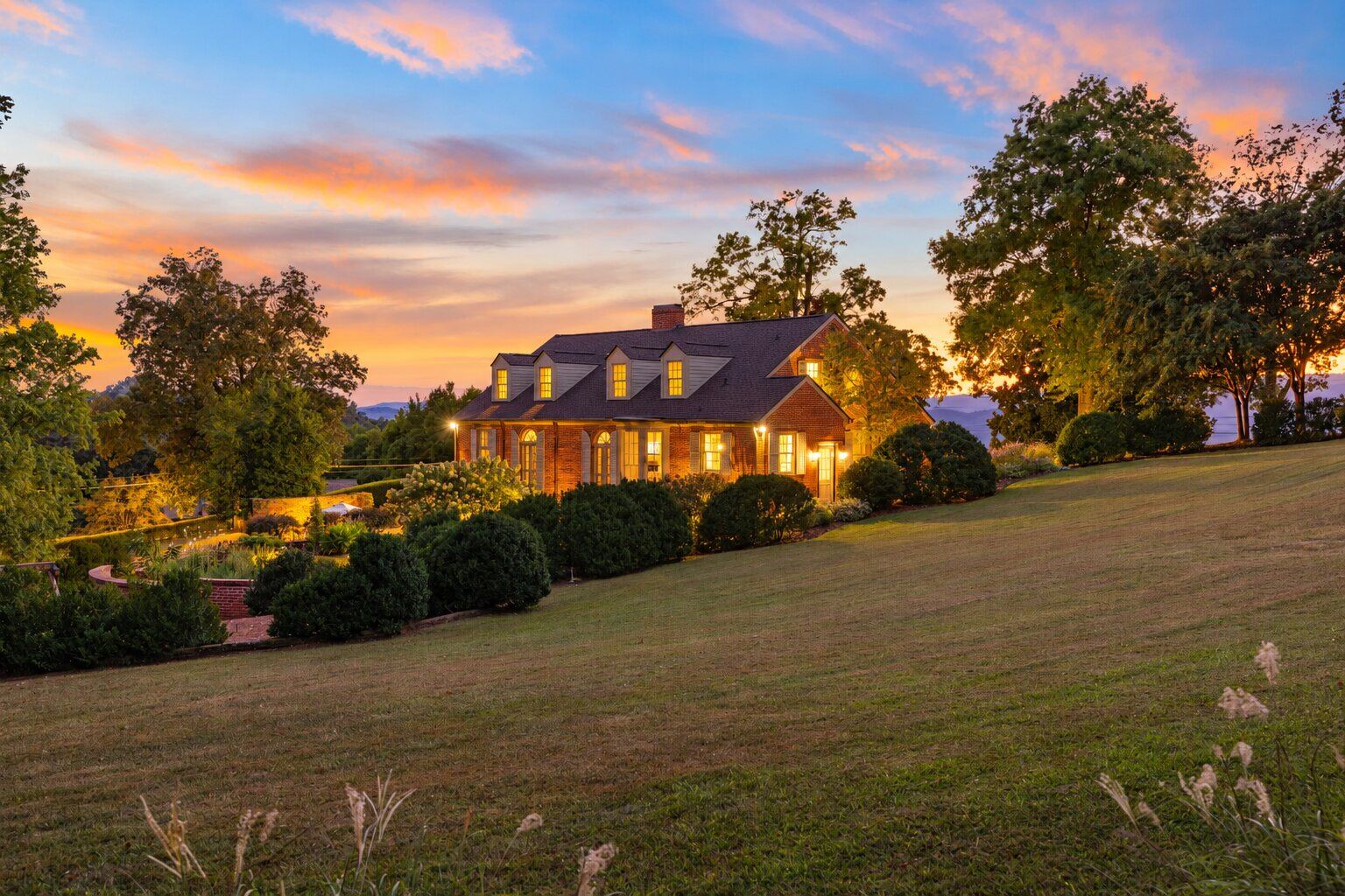 The estate from the lawn at sunset